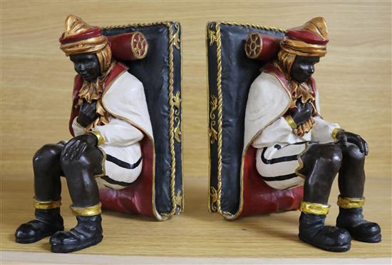 A pair of composition bookends, height 20cm